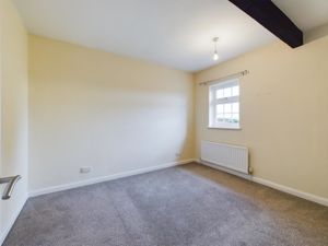 Bedroom One- click for photo gallery